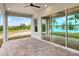 Covered patio with pavers and view of lake at 2116 Sarah Way, Mulberry, FL 33860