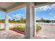 Covered patio with view of lake and landscape at 2116 Sarah Way, Mulberry, FL 33860