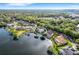 Aerial view showcasing the home's waterfront location at 5933 Lake Victoria Dr, Lakeland, FL 33813