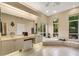 Spa-like bathroom with a soaking tub, double vanity, and large shower at 5933 Lake Victoria Dr, Lakeland, FL 33813