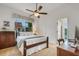 Charming bedroom with lake view and private access to bathroom at 5933 Lake Victoria Dr, Lakeland, FL 33813