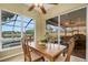 Breakfast nook with lake and pool view at 5933 Lake Victoria Dr, Lakeland, FL 33813