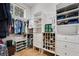 Large walk-in closet with custom built-in shelving and drawers at 5933 Lake Victoria Dr, Lakeland, FL 33813