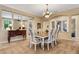 Formal dining room with large table and plenty of natural light at 5933 Lake Victoria Dr, Lakeland, FL 33813