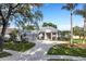 Stunning curb appeal, with circular driveway and lush landscaping at 5933 Lake Victoria Dr, Lakeland, FL 33813