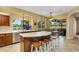 Island kitchen with breakfast area and lake view at 5933 Lake Victoria Dr, Lakeland, FL 33813
