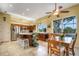 Spacious kitchen featuring island, stainless steel appliances, and breakfast nook at 5933 Lake Victoria Dr, Lakeland, FL 33813