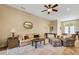 Cozy living area with ample natural light and comfortable seating at 5933 Lake Victoria Dr, Lakeland, FL 33813