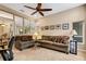 Living room with comfy couch and built-in workspace at 5933 Lake Victoria Dr, Lakeland, FL 33813