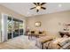 Relaxing living room with plush seating and access to patio at 5933 Lake Victoria Dr, Lakeland, FL 33813
