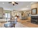 Bright living room with fireplace and access to backyard at 5933 Lake Victoria Dr, Lakeland, FL 33813