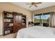 Main bedroom with built-ins and water view at 5933 Lake Victoria Dr, Lakeland, FL 33813
