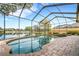 Enjoy this amazing pool and spa with lake views! at 5933 Lake Victoria Dr, Lakeland, FL 33813