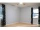 Simple bedroom with light walls and wood floors at 1305 Avenue S Nw, Winter Haven, FL 33881