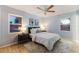 Comfortable bedroom with wood floors, contemporary decor, and ample natural light at 1305 Avenue S Nw, Winter Haven, FL 33881