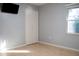 Bedroom with light gray walls and laminate wood floors at 1305 Avenue S Nw, Winter Haven, FL 33881