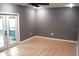 Bright bedroom featuring tile floors and French doors at 1305 Avenue S Nw, Winter Haven, FL 33881