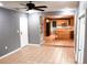 Open dining area with tile floors and kitchen access at 1305 Avenue S Nw, Winter Haven, FL 33881