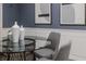 Dining room close up featuring a glass table, chairs, and neutral paint color at 1305 Avenue S Nw, Winter Haven, FL 33881