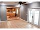 Open floor plan with a view of kitchen and access to backyard at 1305 Avenue S Nw, Winter Haven, FL 33881