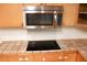 Stainless steel appliances in this galley kitchen at 1305 Avenue S Nw, Winter Haven, FL 33881