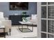 Modern living room showcasing stylish furniture, a flat-screen TV, and elegant decor at 1305 Avenue S Nw, Winter Haven, FL 33881