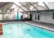 Refreshing pool with covered patio area at 1305 Avenue S Nw, Winter Haven, FL 33881