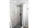 Updated shower stall with marble tile and modern fixtures at 1305 Avenue S Nw, Winter Haven, FL 33881