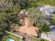 Single-story home nestled among lush greenery at 3940 Laurel Branch Dr, Lakeland, FL 33810