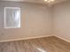 Bedroom with patterned wallpaper and vinyl plank flooring at 3940 Laurel Branch Dr, Lakeland, FL 33810