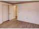 Spacious bedroom with double doors and laminate flooring at 3940 Laurel Branch Dr, Lakeland, FL 33810