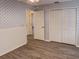 Bedroom with double door closet and vinyl flooring at 3940 Laurel Branch Dr, Lakeland, FL 33810