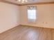 Bedroom with window, ceiling fan, and vinyl flooring at 3940 Laurel Branch Dr, Lakeland, FL 33810