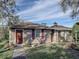 Guest house exterior with a walkway and landscaping at 3940 Laurel Branch Dr, Lakeland, FL 33810