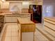 Bright kitchen features ample counter space, wood island, and stainless steel appliances at 3940 Laurel Branch Dr, Lakeland, FL 33810