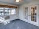 Sunroom with French doors and carpet flooring at 3940 Laurel Branch Dr, Lakeland, FL 33810