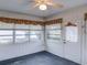 Bright sunroom featuring window seating and exterior access at 3940 Laurel Branch Dr, Lakeland, FL 33810