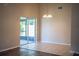 Bright dining area with tile flooring and sliding glass doors to the outdoor patio at 5058 Cimarron Dr, Lakeland, FL 33813