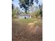 Large backyard with shed and wooden fence at 520 Green Cir, Fort Meade, FL 33841