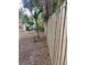 Large backyard with wooden fence and plants at 520 Green Cir, Fort Meade, FL 33841