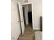 Hallway with light walls and wood-look flooring at 520 Green Cir, Fort Meade, FL 33841