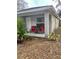 Side view of a gray house with a covered porch at 520 Green Cir, Fort Meade, FL 33841