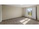 Spacious bedroom with carpet flooring and large window at 8183 Westmont Terrace Dr, Lakeland, FL 33810
