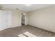 Bedroom with carpet, double doors and ensuite bathroom at 8183 Westmont Terrace Dr, Lakeland, FL 33810