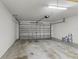 Spacious garage with automatic door opener and ample storage space at 8183 Westmont Terrace Dr, Lakeland, FL 33810
