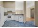 Kitchen with white cabinets, blue tile floor, and stainless steel appliances at 8183 Westmont Terrace Dr, Lakeland, FL 33810