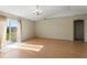 Bright living room with hardwood floors and sliding glass doors at 8183 Westmont Terrace Dr, Lakeland, FL 33810