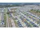 Aerial view of the house and surrounding neighborhood at 1034 Corso Dr, Winter Haven, FL 33884