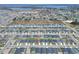 Aerial view of a residential neighborhood with the subject property marked at 1034 Corso Dr, Winter Haven, FL 33884
