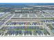 Aerial view of the house and surrounding neighborhood at 1034 Corso Dr, Winter Haven, FL 33884